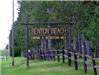 Wooden sign with Benton Beach camping and recreation area