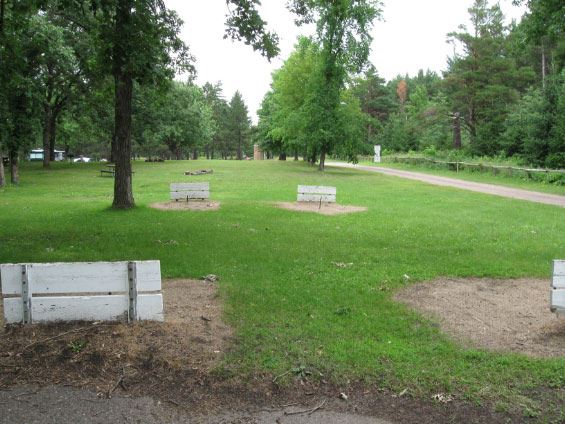 Horse shoe pits under trees
