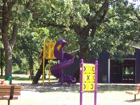 Playground slide and tic tac toe board